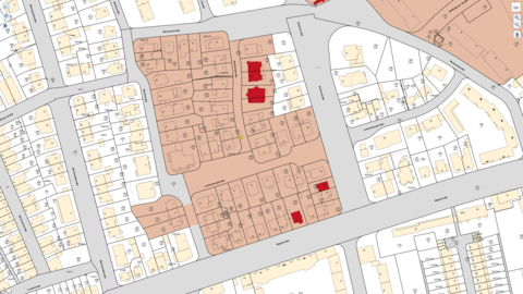 Ausschnitt einer Karte. Die Villenkolonie ist im Mittelpunkt und um sie als Gesamtanlage zu kennzeichnen, hellrot hinterlegt. Einzelne Gebäude, die Kulturdenkmäler, sind dunkelrot hinterlegt.